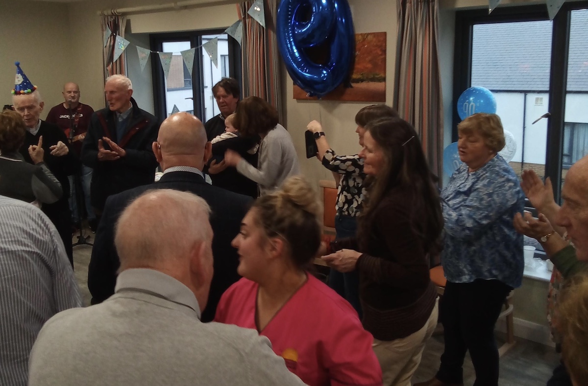 Residents dancing at birthday party